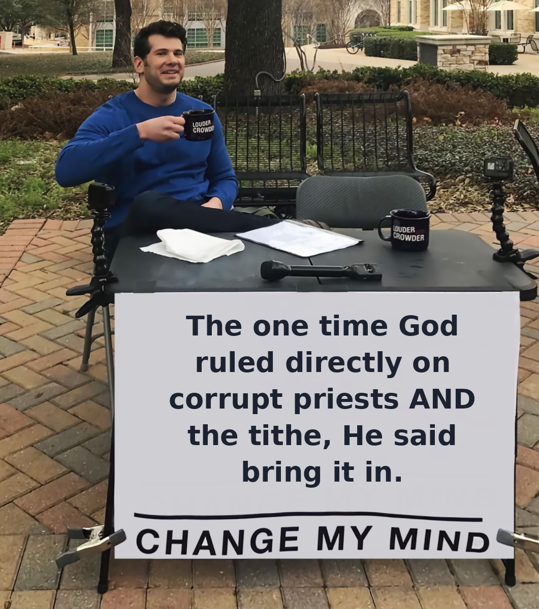 Meme: man at a table with a sign reading 'The one time God ruled directly on corrupt priests and the tithe, He said bring it in &mdash; change my mind'